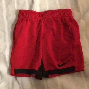 Red Nike boys athletic shorts